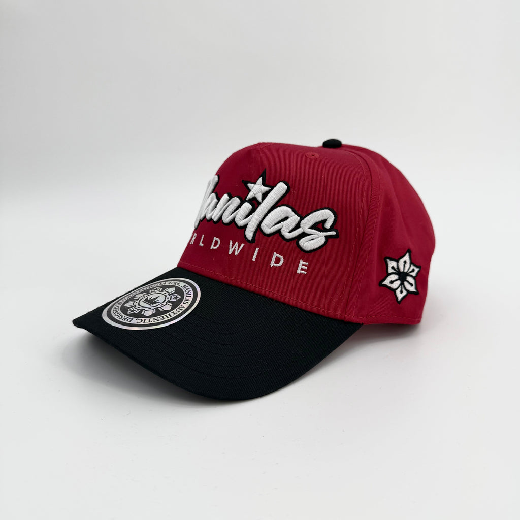 Red and black cap with branding on a light gray background